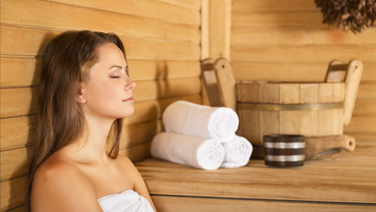 Lady relaxing in the sauna