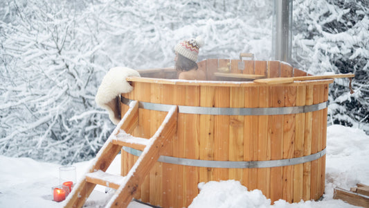 Person in an ice bath in the snow